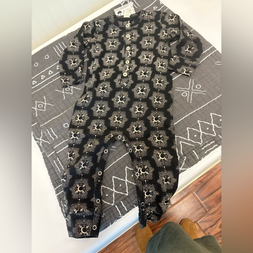 Kate Quinn Black and Cream Union Suit